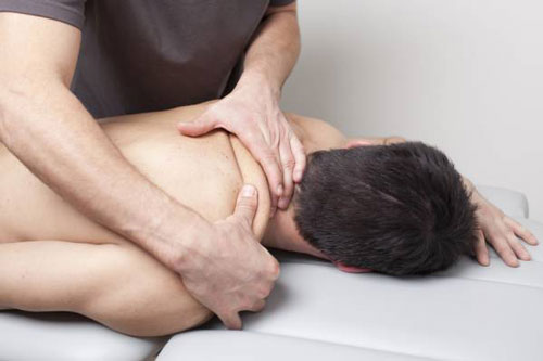 man getting deep tissue massage